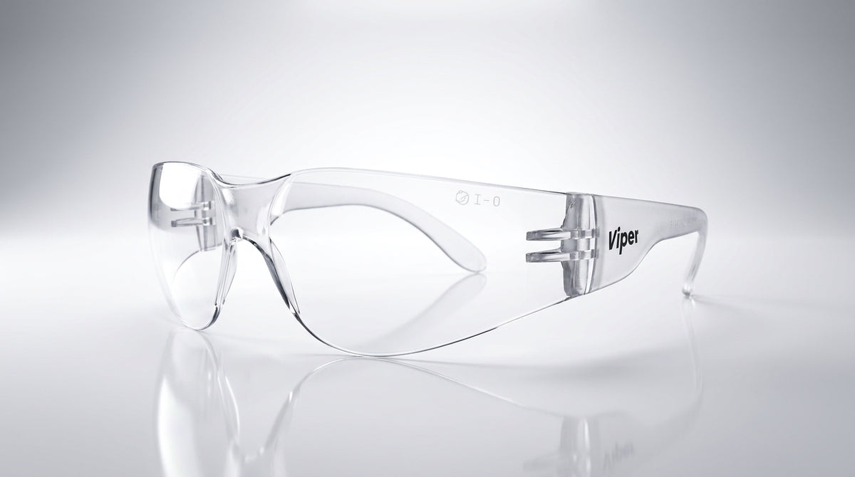 Clear anti-fog safety glasses by Hlpmedical with wraparound lenses, displayed on a gradient background.
