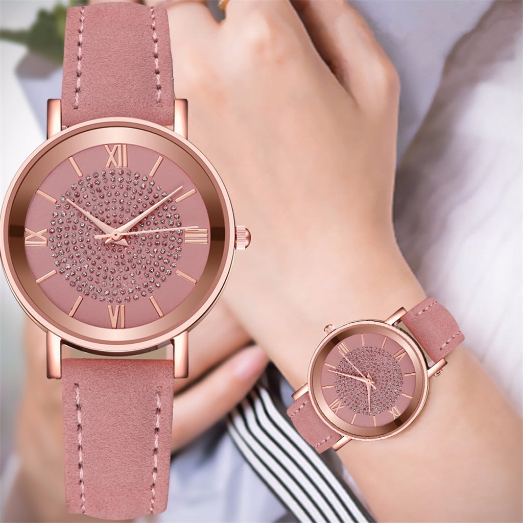Hlpmedical platinum dress watch with rose gold stainless steel dial, leather strap, Roman numerals, and minimalist analog design.