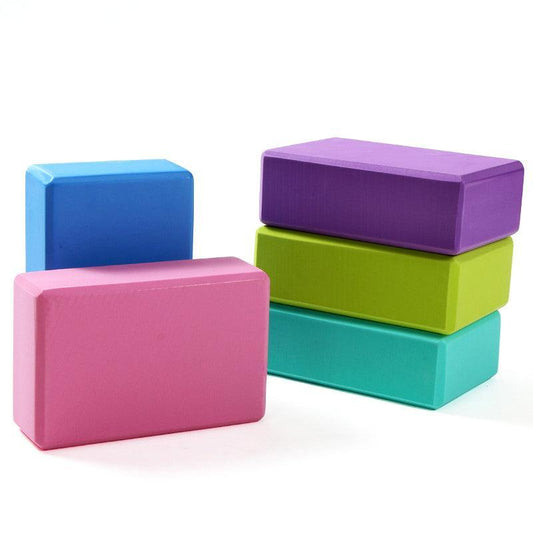 Pink foam yoga blocks for exercise and Pilates, ideal for stretching and fitness routines, from Hlpmedical.
