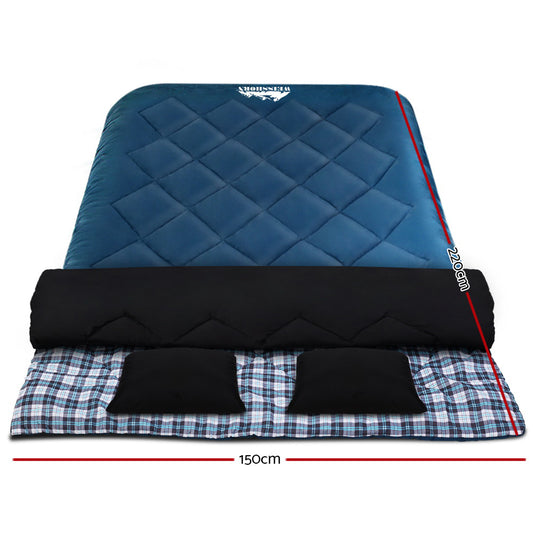 Blue Weisshorn double sleeping bag with pillow, ideal for camping and hiking in cold weather, rated for -10°C thermal insulation.