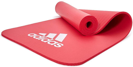 Red Adidas Fitness Mat 7mm for exercise, yoga, judo, and pilates, designed for gym and training floor workouts.