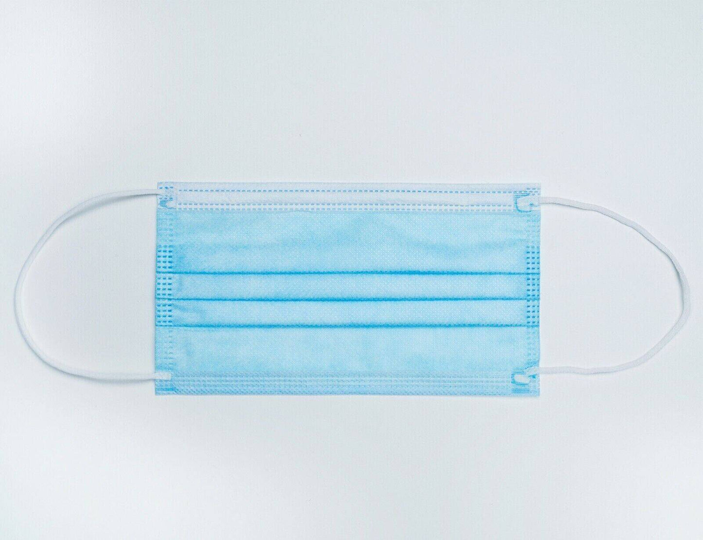 Blue Level 3 surgical face mask from Hlpmedical, pack of 50, showing PPE mask with ear loops and pleated design.