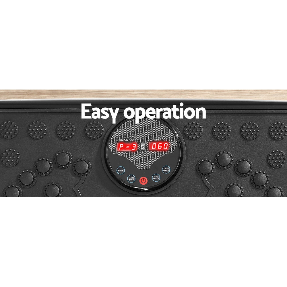 Black Everfit vibration machine platform with resistance rope for home gym workouts, designed for vibration exercise routines.
