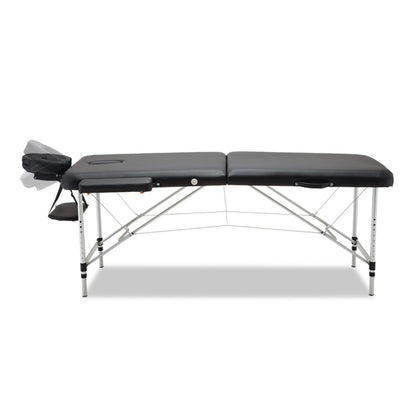 Black Hlpmedical Zenses portable massage table, 75cm wide, with 2-fold aluminum frame for easy transport and relaxation therapy.