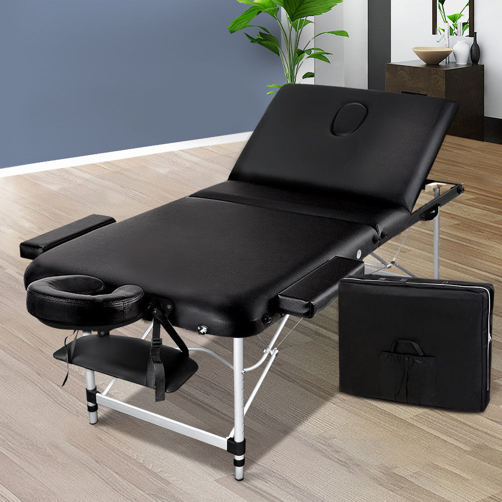 Black portable Zenses massage table by Hlpmedical with 70cm width, three-fold aluminum design for easy relaxation and beauty treatments.
