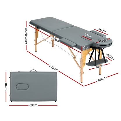 Portable grey Zenses massage table by Hlpmedical with 56cm height, 2-fold wooden design for relaxation and beauty treatments.
