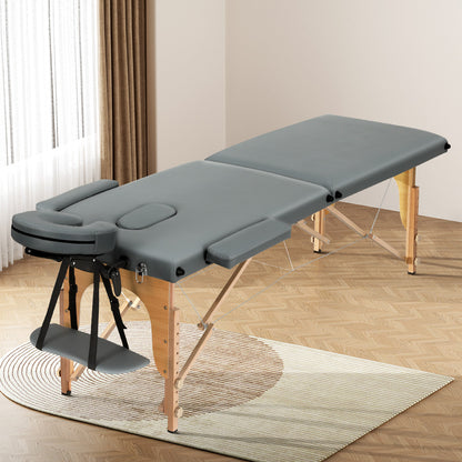 Grey portable Zenses massage table with 2-fold wooden frame, 56cm width, designed for relaxation and beauty treatments.