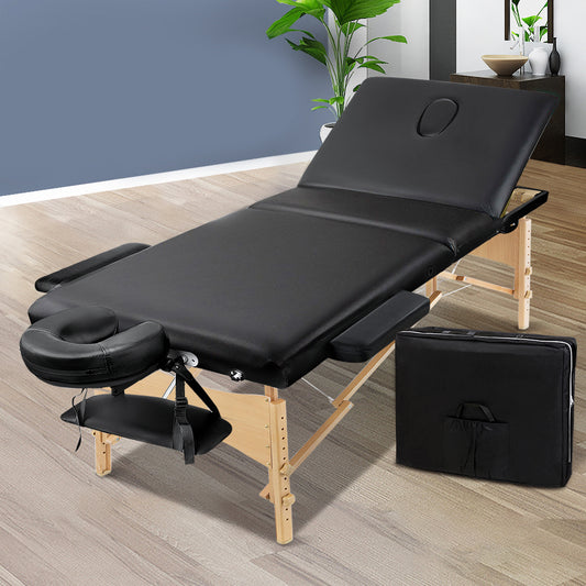 Black portable Zenses massage table, 60cm wide, 3-fold wooden design for relaxation and beauty treatments.