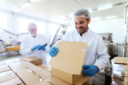 Blue nitrile examination gloves from HLP Medical Supplies on production line, powder-free and suitable for medical use.