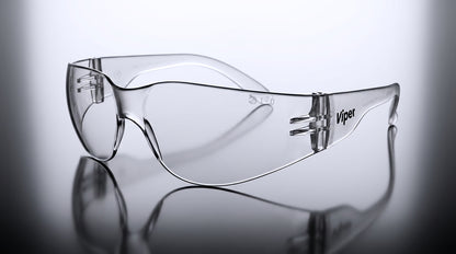 Clear anti-fog safety glasses by Hlpmedical shown on gradient background, designed for eye protection in safety environments.