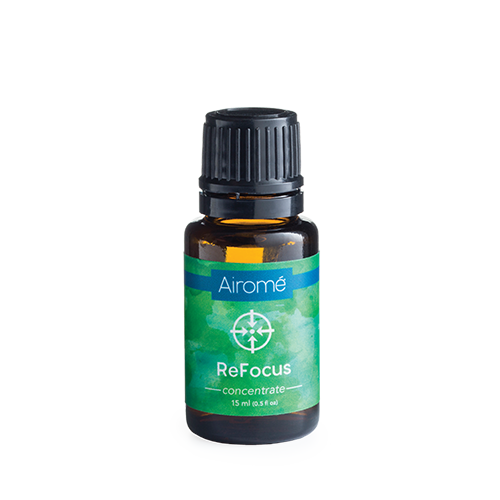 ReFocus essential oil blend in a glass bottle, ideal for massage and relaxation, by Hlpmedical.
