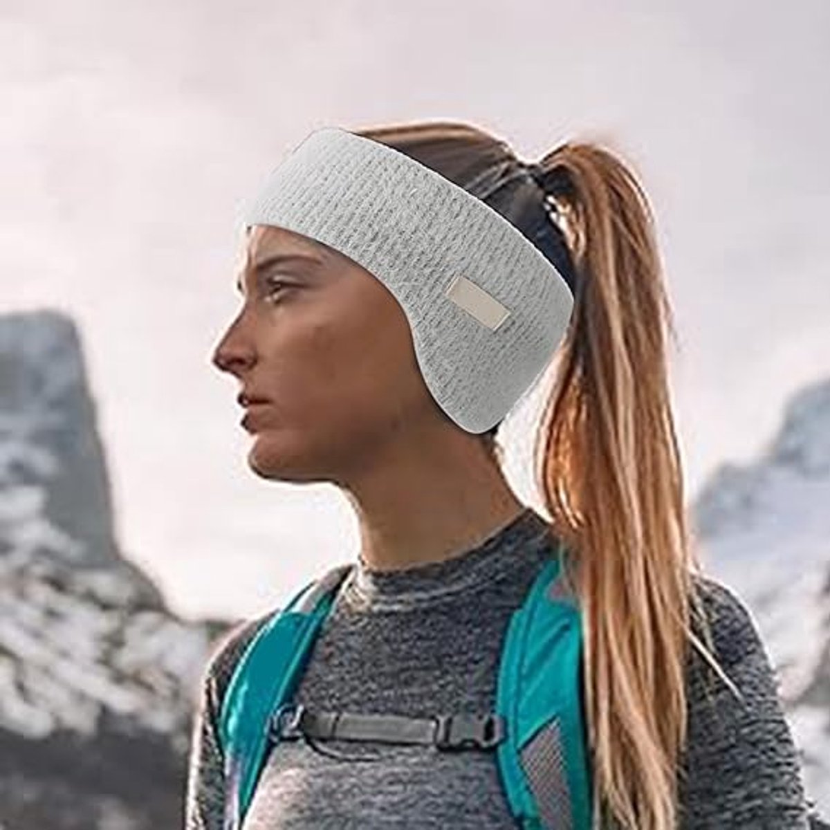 Gray noise-canceling earmuffs for sleeping, warm knit headband, suitable for winter, cycling, and relaxing, by Hlpmedical.