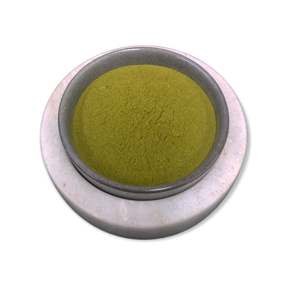 Organic Moringa leaf powder in a 20kg drum from Hlpmedical, food-grade Oleifera supplement for health and nutrition.