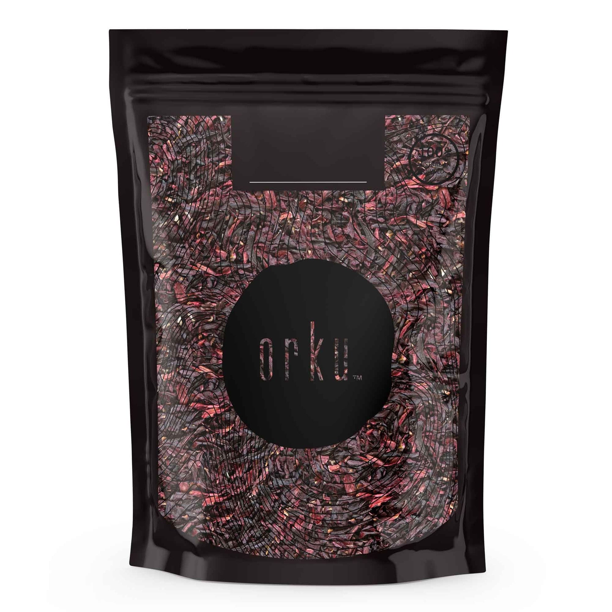 Crushed organic hibiscus rosella flowers in a jar, dried herbal tea supplement for teas and beverages.