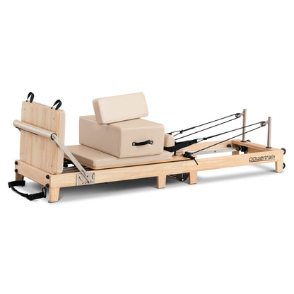 Hlpmedical Powertrain Selina Pilates Reformer Machine with wood frame, jumpboard, sitting box, in oak beige for home gym workouts.