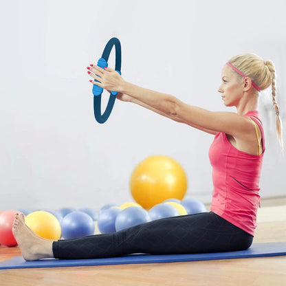 Blue Powertrain Pilates ring by Hlpmedical for yoga and home workouts, showing a circular exercise band with handles.