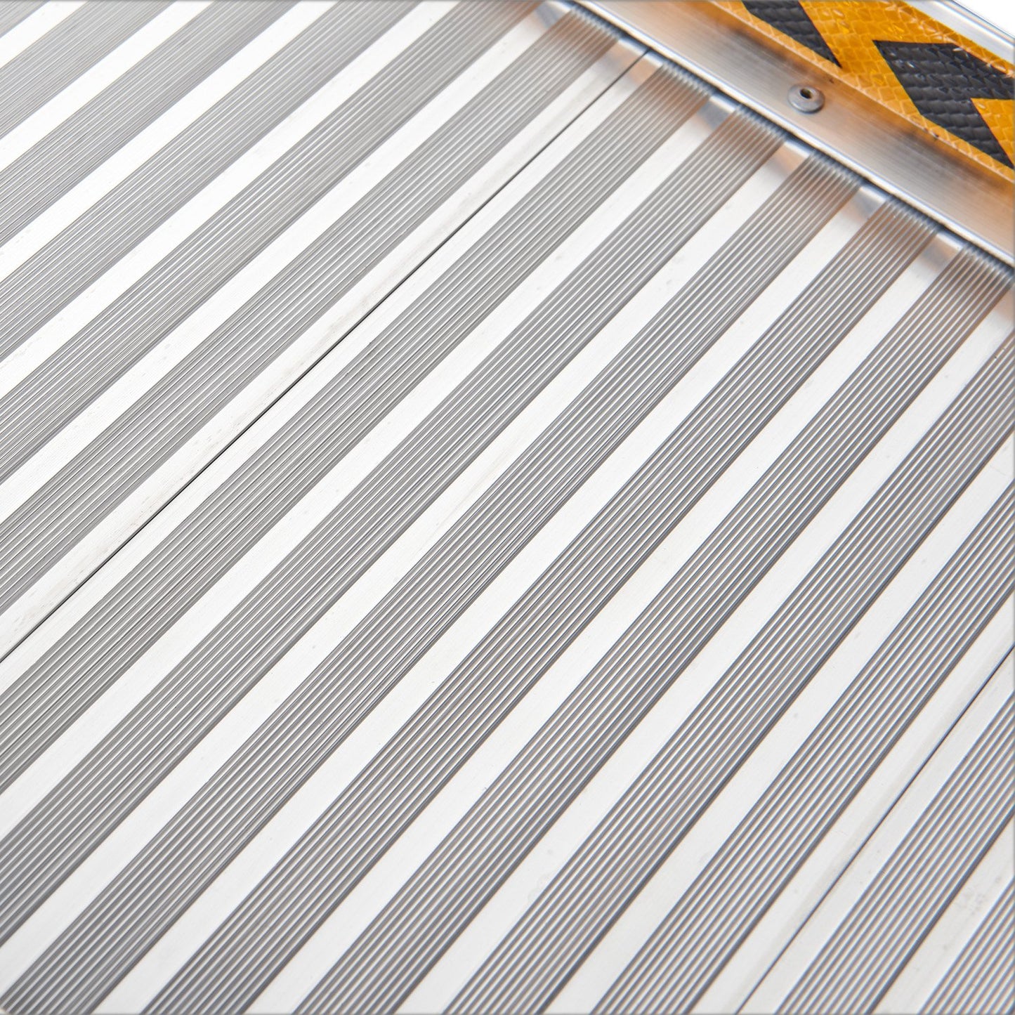 Silver Kartrite 6ft aluminium foldable wheelchair ramp with non-slip surface by Hlpmedical for mobility and accessibility.