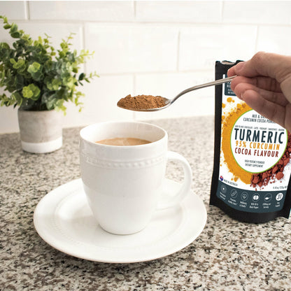 Organic turmeric powder with cocoa flavor and black pepper, 125g, suitable for health and nutritional supplements.