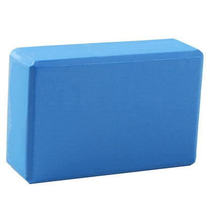 Two pink foam yoga blocks for exercise and Pilates, used for stretching and support during yoga workouts.