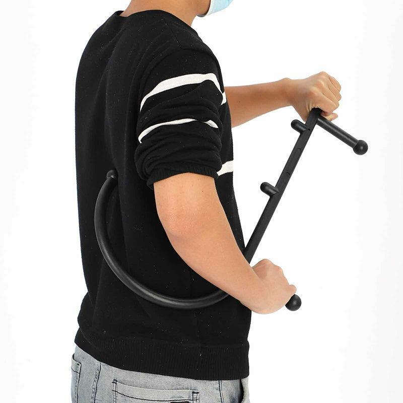 Black S-shaped self-massage tool with trigger point handles for back and body relaxation, designed by Hlpmedical.