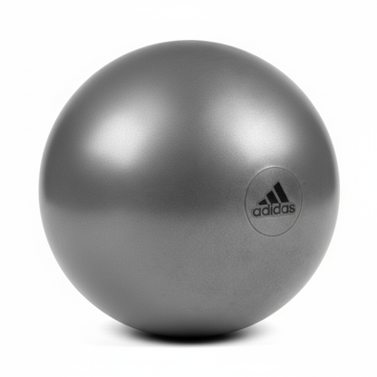 Green Adidas 75cm gym ball with pump for yoga, Pilates, and fitness exercises, designed for training and birthing support.