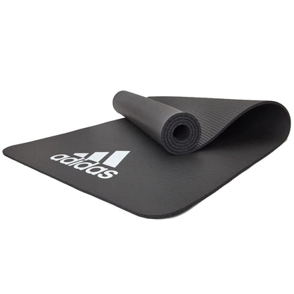 Grey Adidas Fitness Mat 7mm exercise yoga and Pilates mat from Hlpmedical, ideal for gym, judo, and training workouts.
