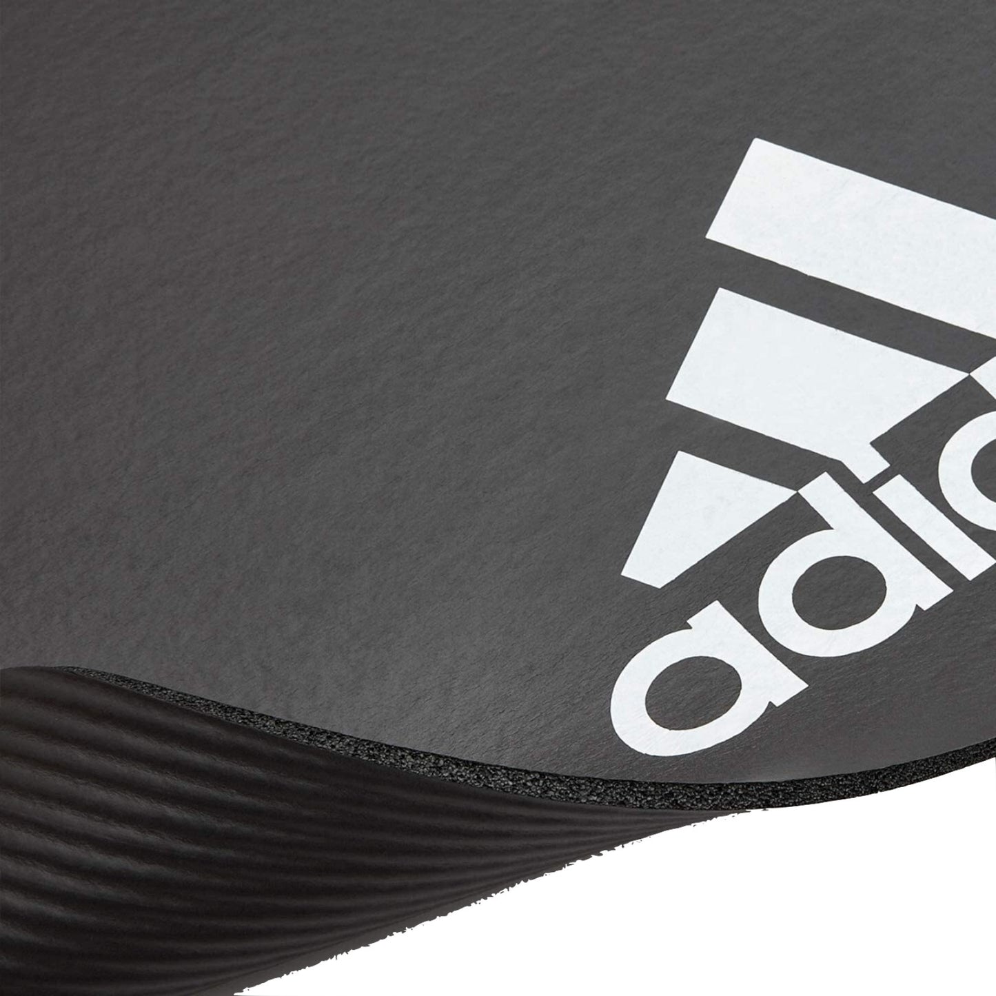 Grey Adidas fitness mat for yoga, Pilates, and exercise, featuring 7mm thickness for comfortable gym and training workouts.