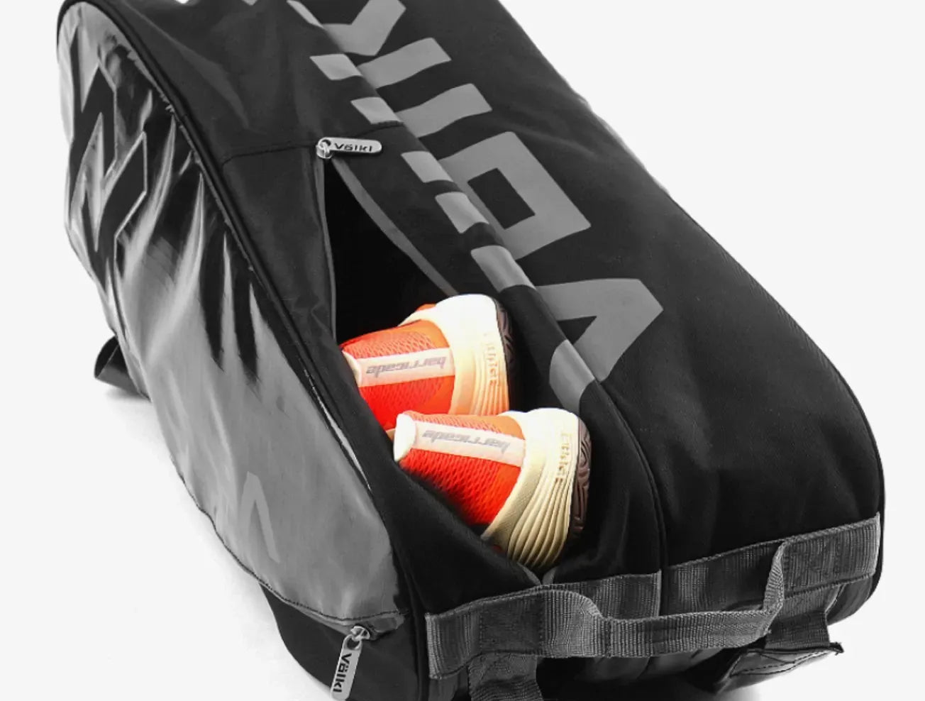Volkl Primo Combi Tennis Bag in black and charcoal with space for 6-9 racquets, designed for sports and tennis enthusiasts.