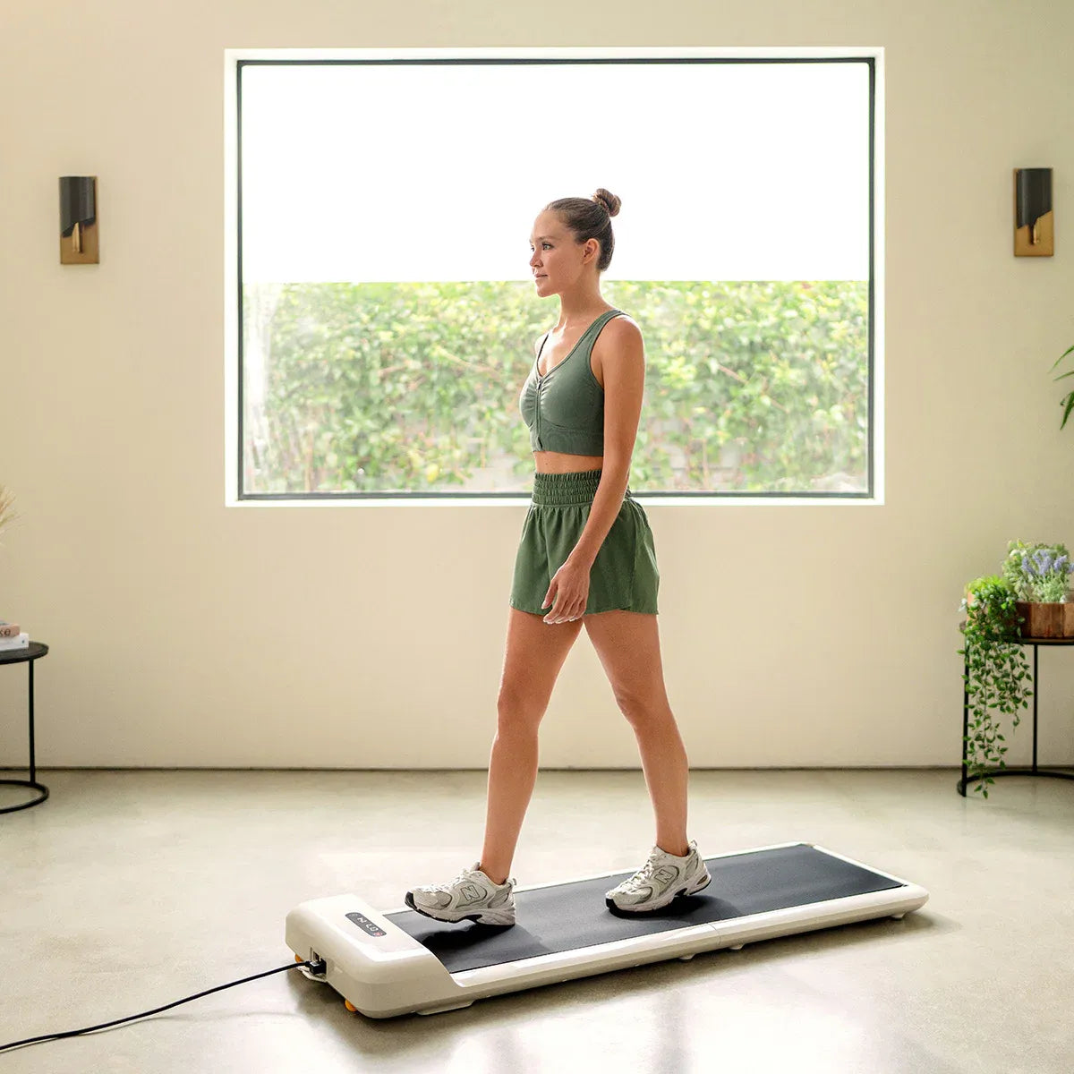 Hlpmedical WalkingPad C2 compact folding treadmill in white, suitable for home exercise and fitness workouts.