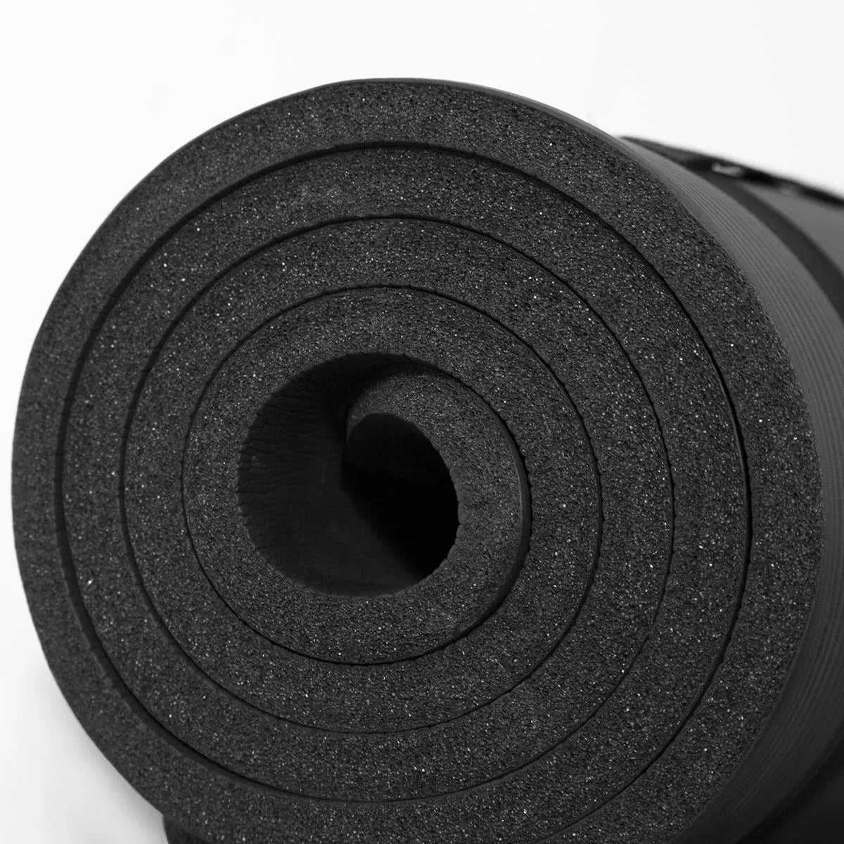 Black CORTEX yoga mat, 1.8m by 0.6m with 15mm thickness, suitable for yoga and fitness exercises, by Hlpmedical.