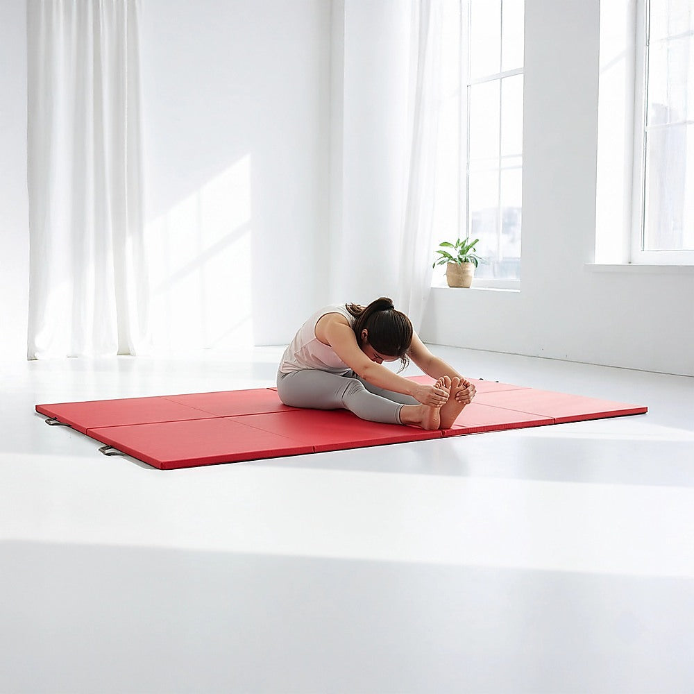 Red folding exercise mat from Hlpmedical, ideal for gymnastics, martial arts, yoga, karate, and judo training.