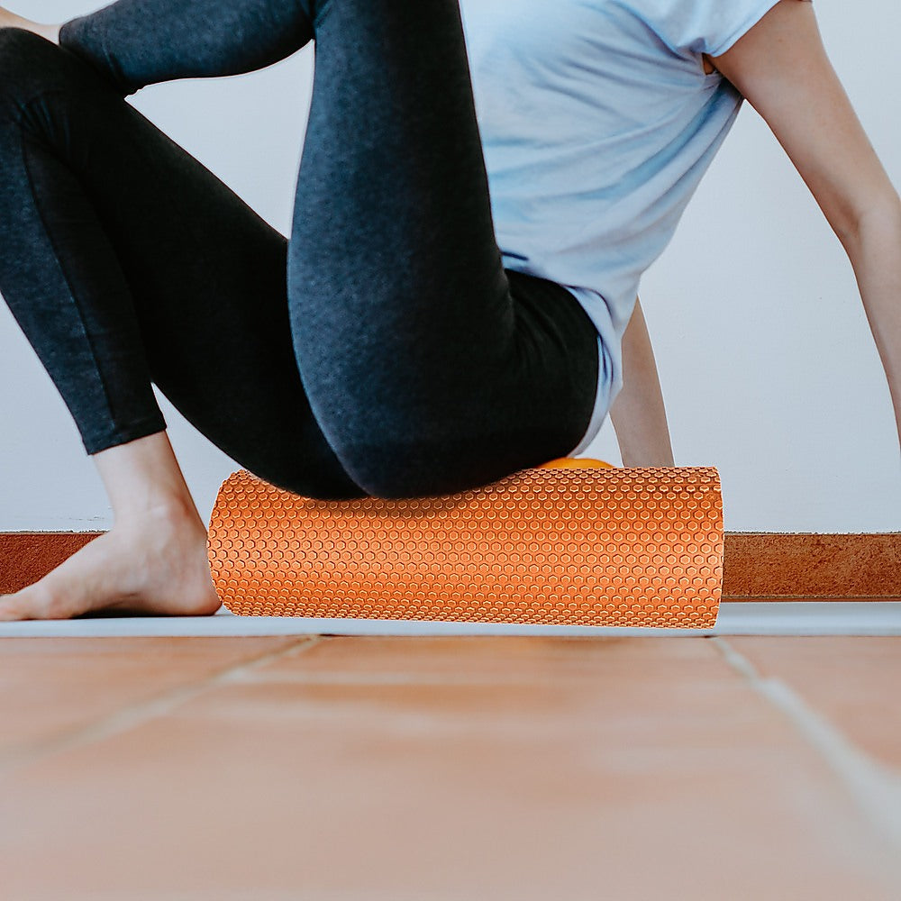 Hlpmedical 45x15cm foam roller for yoga and Pilates, cylindrical shape, textured surface for muscle relief and flexibility exercises.
