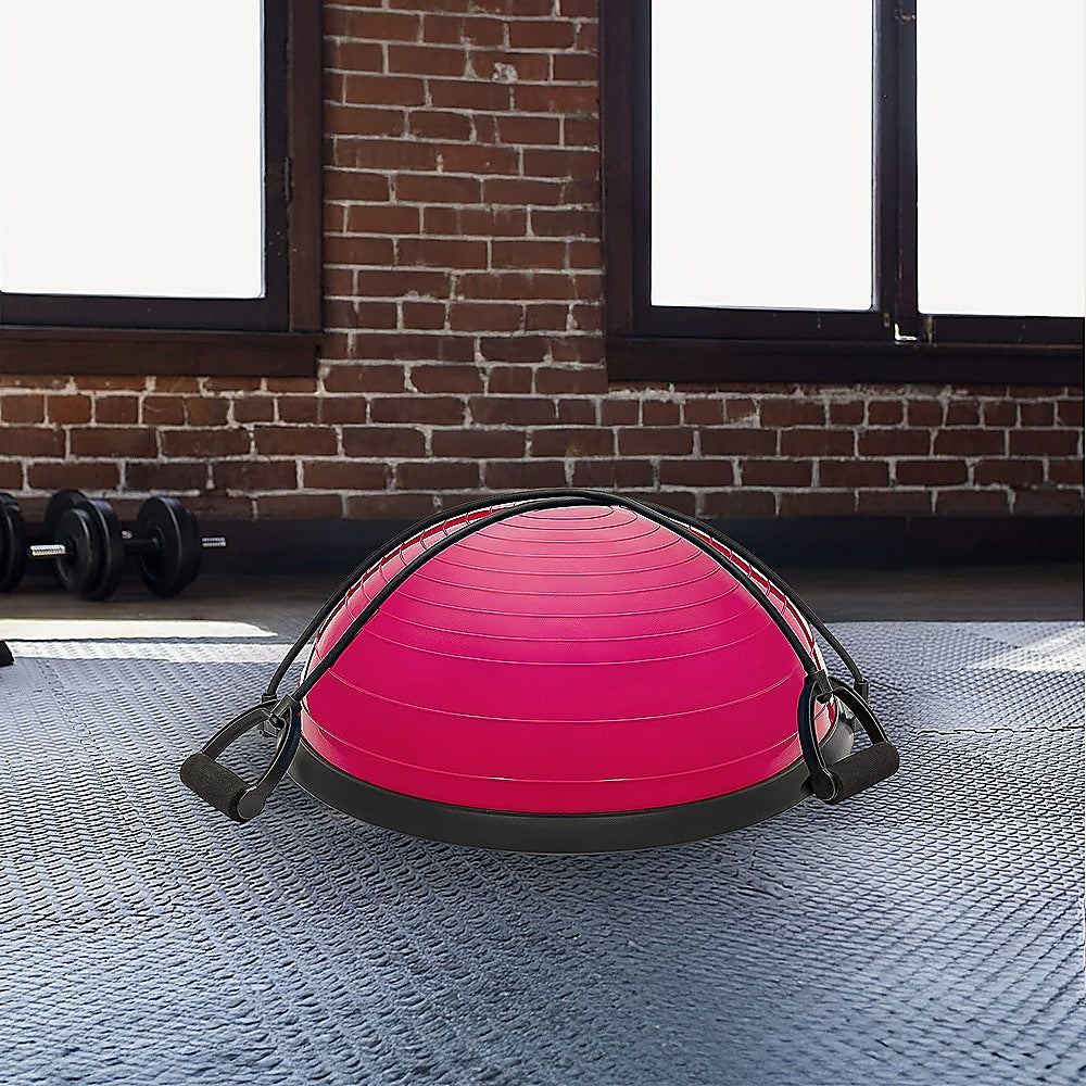 Hlpmedical yoga balance trainer exercise ball with pump and resistance bands for arm, leg, and core workouts in a fitness setting.