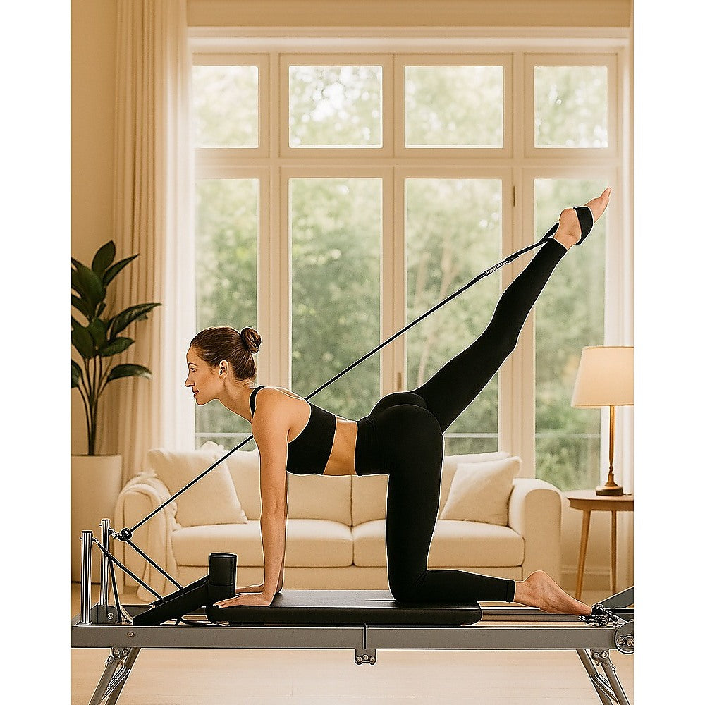 Foldable Hlpmedical Pilates Reformer Machine for yoga and fitness exercises, featuring a compact design with padded supports.