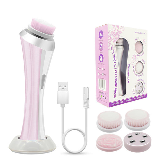 Pink rechargeable facial cleansing brush kit with four heads and charging dock, designed for gentle skincare.