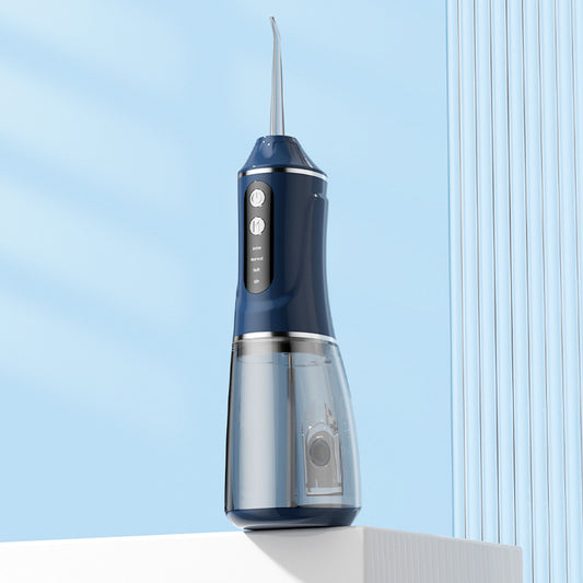 Blue portable electric oral irrigator with four nozzles and three pressure modes by Hlpmedical, ideal for effective oral hygiene.