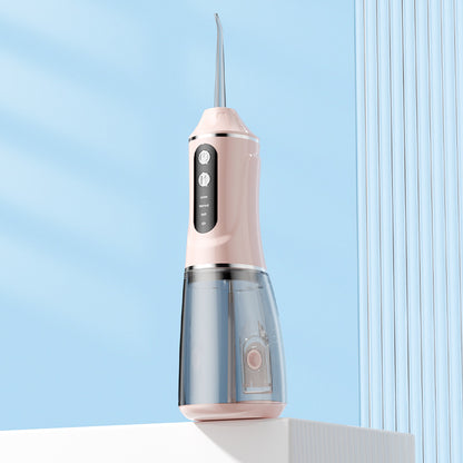 Portable electric oral irrigator by Hlpmedical with pink body, 4 nozzles, and 3 pressure modes for effective oral hygiene.