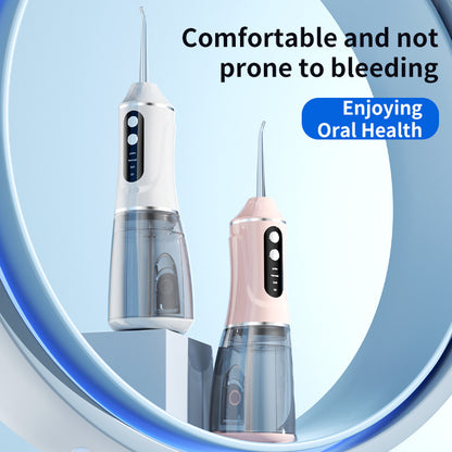 Black portable electric oral irrigator by Hlpmedical with four nozzles and three pressure modes for effective oral care.
