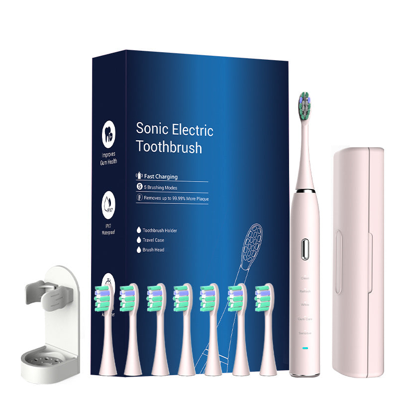 Pink Sonic rechargeable electric toothbrush with 8 replacement heads, travel case, multiple modes, and smart timer from Hlpmedical.