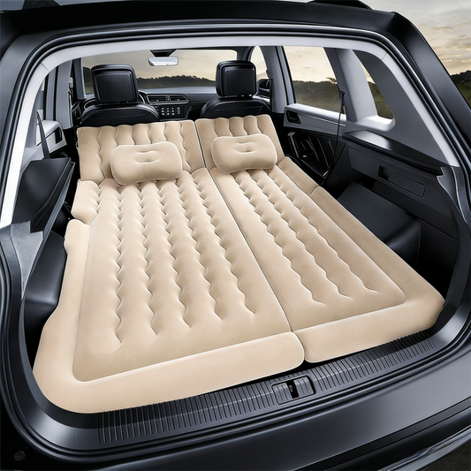 Beige multi-chamber car inflatable air mattress with electric pump, pillows, and storage bag for trunk sleeping and camping.