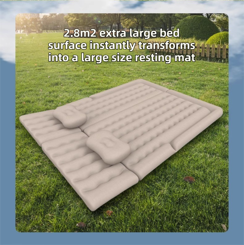 Hlpmedical grey multi-chamber inflatable car air mattress with electric pump, pillows, and storage bag inside a vehicle trunk