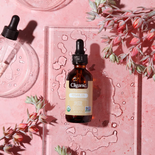 Bottle of Hlpmedical 100% pure Moroccan Argan Oil in a 120ml container, suitable for hair, face, and skin care.