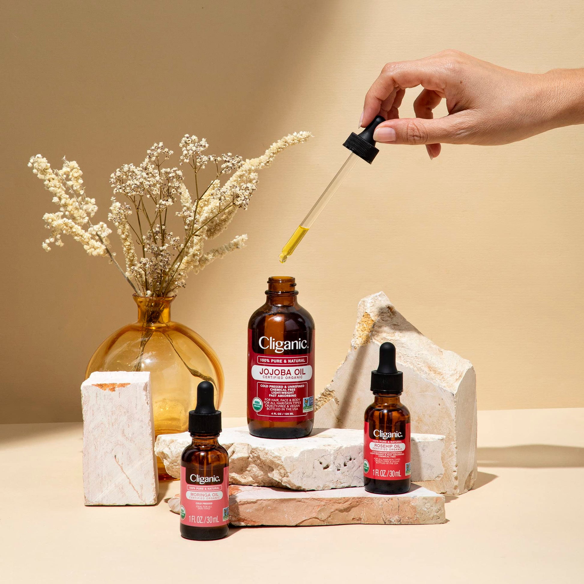 Bottle of Hlpmedical 100% pure Moroccan argan oil for hair, face, and skin in a 120ml container, suitable for massage and skincare.