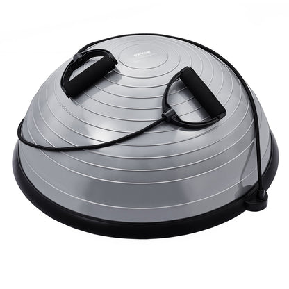 Gray half exercise ball trainer with resistance bands, foot pump, suitable for full body workouts and stability training at home.