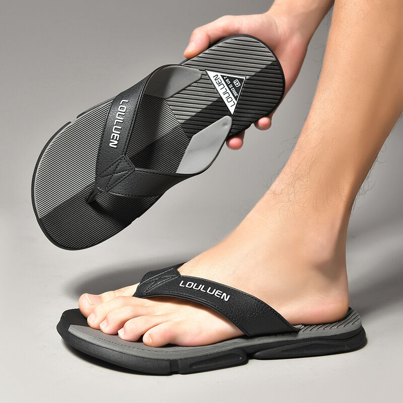 Grey men's flip flops with EVA-PVC dual sole, featuring slip-resistant design and casual style for comfort and everyday wear.