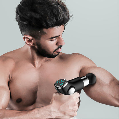 Hlpmedical FitSmart LCD display mini vibration therapy massage device in black, designed for relaxing massage therapy sessions.