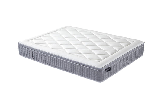 Hlpmedical And Sleep Aura Queen Mattress shown on a bed with plush bedding, highlighting its comfortable, supportive design.