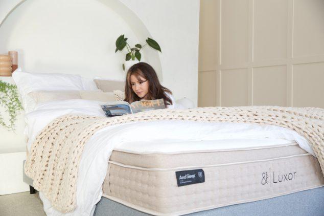 Hlpmedical And Sleep Aura Queen Mattress with plush fabric surface and supportive foam layers, ideal for comfortable sleep.