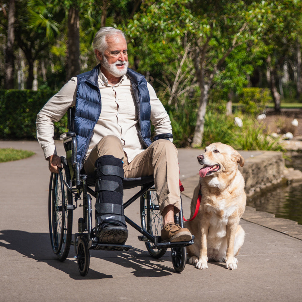 Equipmed 24-inch folding bariatric wheelchair by Hlpmedical with XL wide design, dark grey hammertone, park brakes, and retractable armrests.