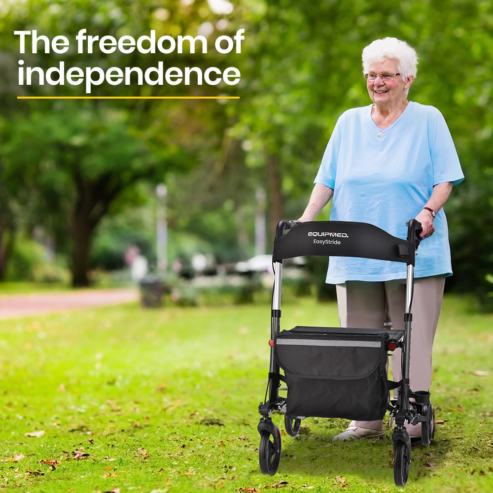 Foldable aluminium walking frame rollator in titanium color with attached bag and seat, designed for mobility support by Hlpmedical.
